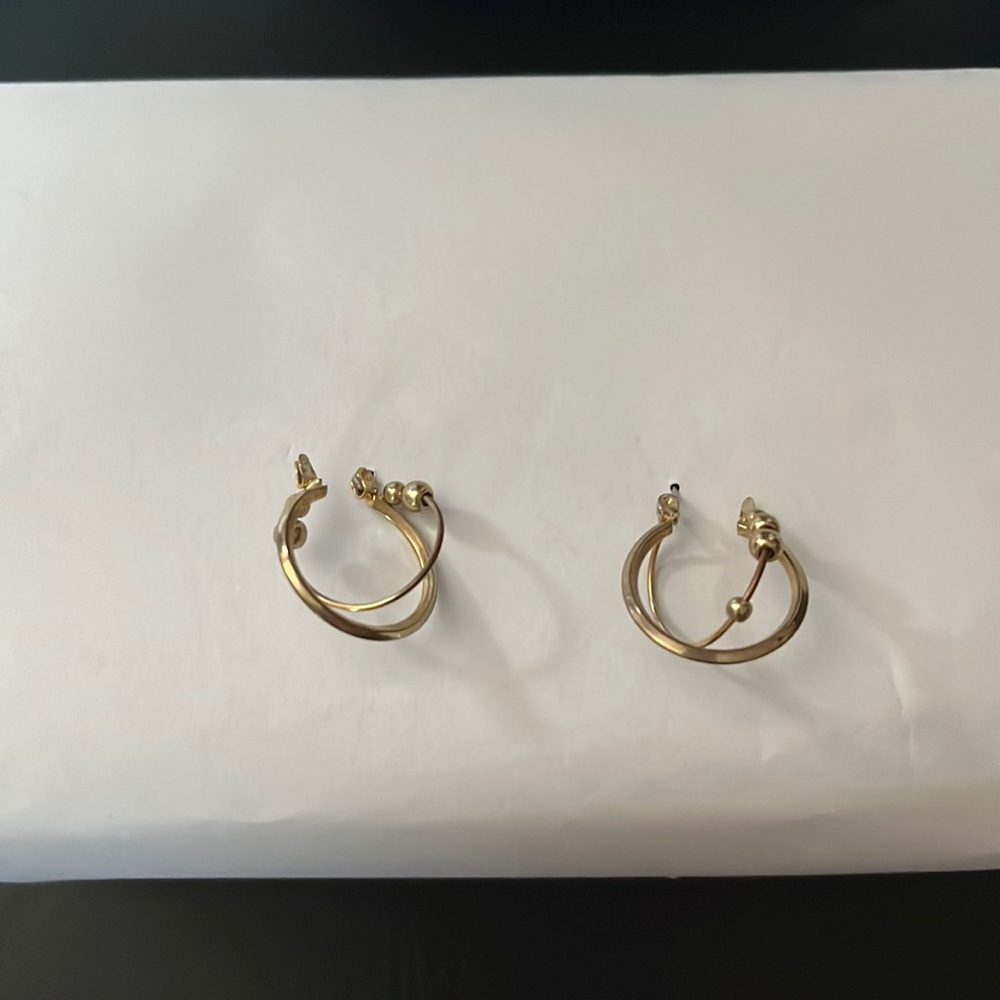 earrings gold with 2 hoops one with balls on it